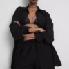 Pantaloni cu croi larg din amestec de bumbac Pantaloni cu croi larg din amestec de bumbac