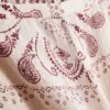Pantaloni cu croi larg din satin șifonat de la Paula Echevarría