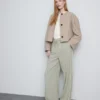 Pantaloni cu croi larg și dungi laterale Pantaloni cu croi larg și dungi laterale
