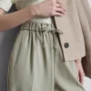 Pantaloni cu croi larg și dungi laterale Pantaloni cu croi larg și dungi laterale