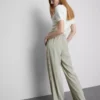 Pantaloni cu croi larg și dungi laterale Pantaloni cu croi larg și dungi laterale