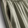 Pantaloni cu croi larg și dungi laterale Pantaloni cu croi larg și dungi laterale