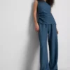 Pantaloni cu croi larg și efect de șifonare de la Paula Echevarría Pantaloni cu croi larg și efect de șifonare de la Paula Echevarría