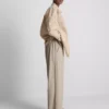 Pantaloni cu croi larg și textură Pantaloni cu croi larg și textură