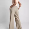 Pantaloni cu croi larg și textură Pantaloni cu croi larg și textură