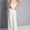Pantaloni cu croi larg și textură Pantaloni cu croi larg și textură