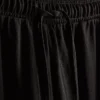 Pantaloni cu croi larg și textură