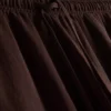 Pantaloni cu croi larg și textură