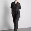 Pantaloni cu croi larg și textură șifonată Pantaloni cu croi larg și textură șifonată