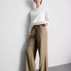 Pantaloni cu croi larg și textură șifonată Pantaloni cu croi larg și textură șifonată