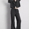 Pantaloni cu croi larg și textură șifonată Pantaloni cu croi larg și textură șifonată