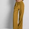 Pantaloni cu croi larg și textură șifonată Pantaloni cu croi larg și textură șifonată