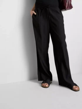 Pantaloni cu croi larg și textură șifonată