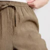 Pantaloni cu croi larg și textură șifonată Pantaloni cu croi larg și textură șifonată