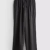 Pantaloni cu croi larg și textură șifonată Pantaloni cu croi larg și textură șifonată