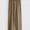 Pantaloni cu croi larg și textură șifonată Pantaloni cu croi larg și textură șifonată