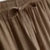 Pantaloni cu croi larg și textură șifonată Pantaloni cu croi larg și textură șifonată