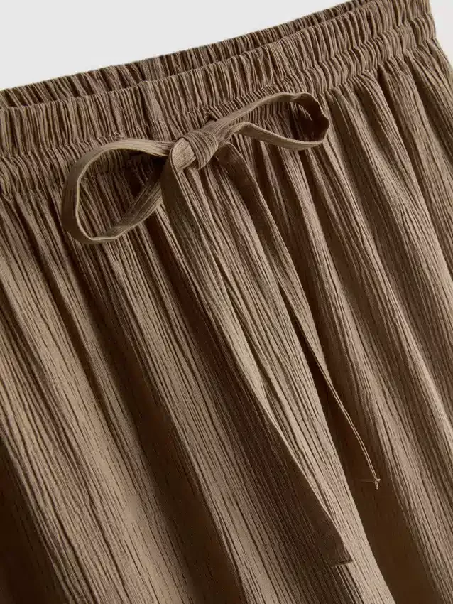 Pantaloni cu croi larg și textură șifonată Pantaloni cu croi larg și textură șifonată