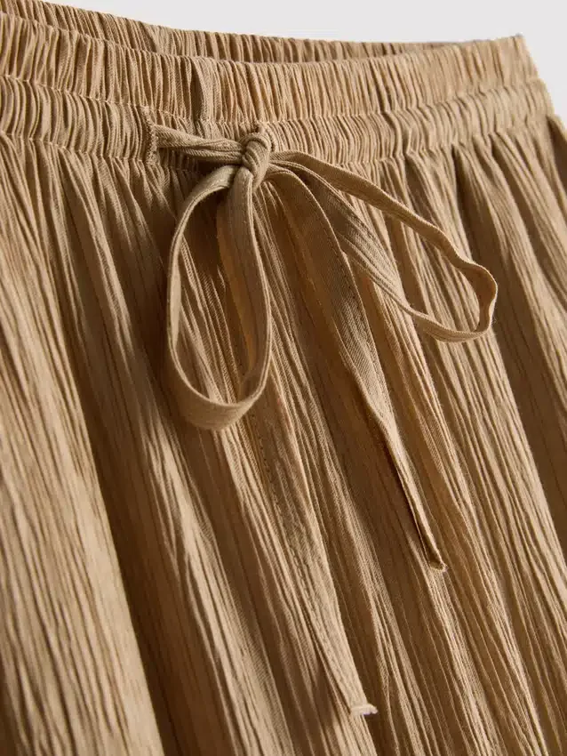 Pantaloni cu croi larg și textură șifonată Pantaloni cu croi larg și textură șifonată