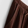 Pantaloni cu croi larg și textură șifonată Pantaloni cu croi larg și textură șifonată