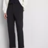 Pantaloni cu croială regular