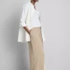 Pantaloni cu talie elastică și croi larg Pantaloni cu talie elastică și croi larg