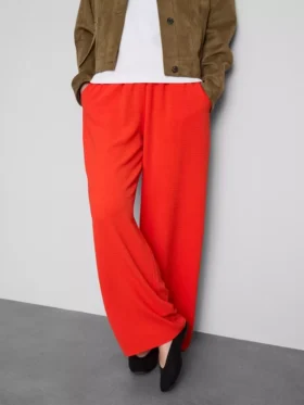 Pantaloni cu talie elastică și croi larg