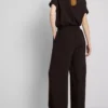 Pantaloni cu talie elastică și croi larg Pantaloni cu talie elastică și croi larg