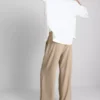 Pantaloni cu talie elastică și croi larg Pantaloni cu talie elastică și croi larg