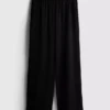 Pantaloni cu talie elastică și croi larg Pantaloni cu talie elastică și croi larg