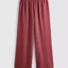 Pantaloni cu talie elastică și croi larg Pantaloni cu talie elastică și croi larg