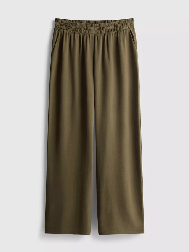 Pantaloni cu talie elastică și croi larg Pantaloni cu talie elastică și croi larg