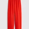 Pantaloni cu talie elastică și croi larg Pantaloni cu talie elastică și croi larg
