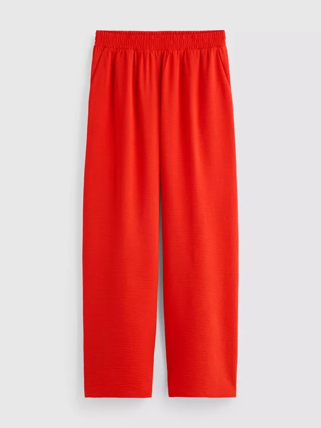 Pantaloni cu talie elastică și croi larg Pantaloni cu talie elastică și croi larg