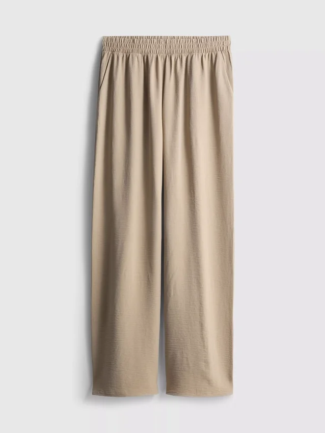 Pantaloni cu talie elastică și croi larg Pantaloni cu talie elastică și croi larg