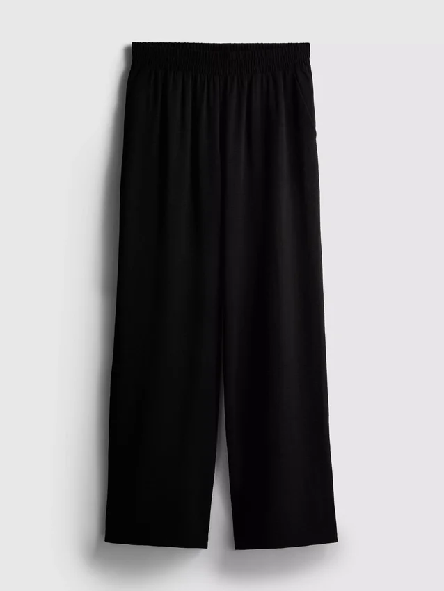 Pantaloni cu talie elastică și croi larg Pantaloni cu talie elastică și croi larg