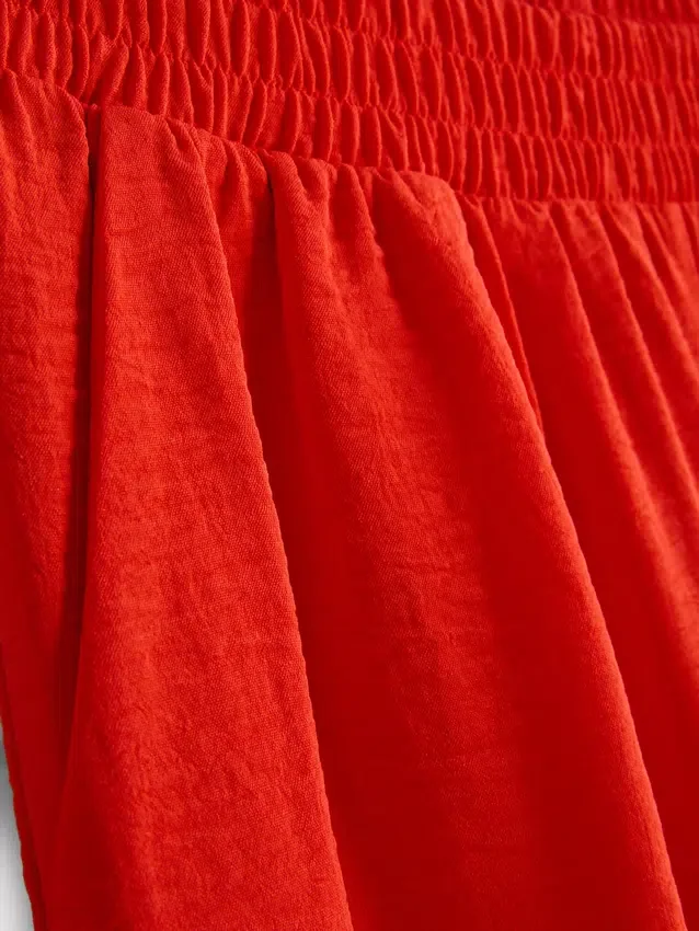Pantaloni cu talie elastică și croi larg Pantaloni cu talie elastică și croi larg