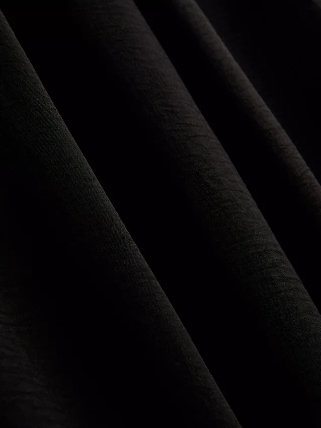Pantaloni cu talie elastică și croi larg Pantaloni cu talie elastică și croi larg