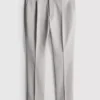 Pantaloni de costum cu croială slim și textură dobby