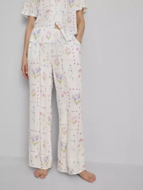 Pantaloni de pijama cu croi larg și imprimeu floral