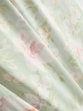 Pantaloni de pijama cu croi larg și imprimeu floral