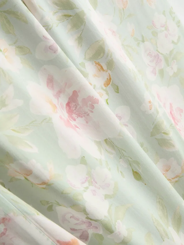 Pantaloni de pijama cu croi larg și imprimeu floral Pantaloni de pijama cu croi larg și imprimeu floral