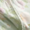 Pantaloni de pijama cu croi larg și imprimeu floral Pantaloni de pijama cu croi larg și imprimeu floral