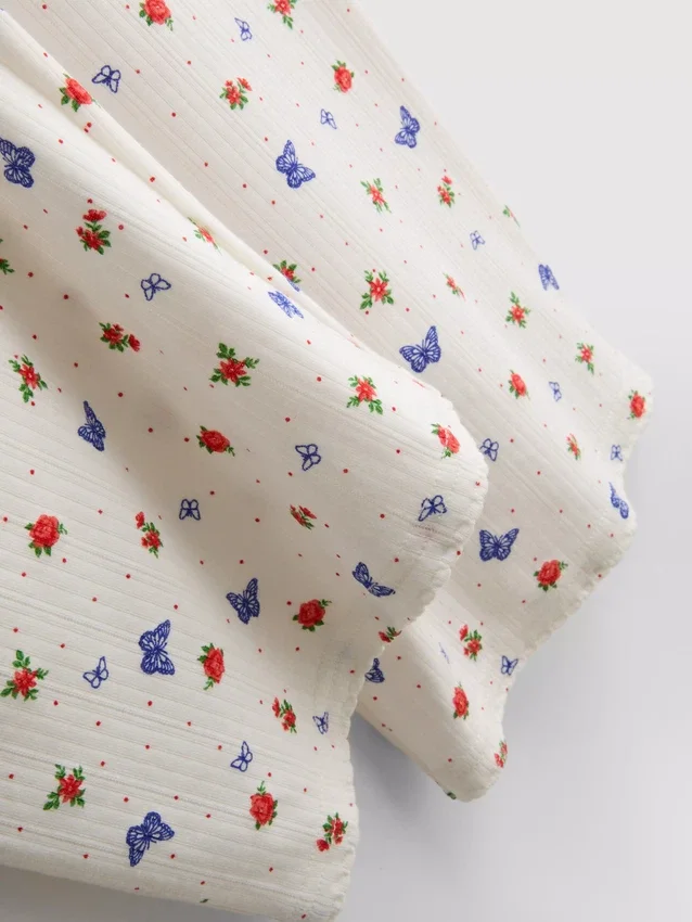 Pantaloni de pijama cu nervuri și imprimeu fluture Pantaloni de pijama cu nervuri și imprimeu fluture