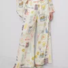 Pantaloni de plajă cu croi larg, cu imprimeu