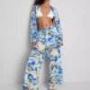 Pantaloni de plajă cu croi larg, cu imprimeu