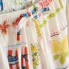Pantaloni de plajă cu croi larg, cu imprimeu