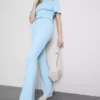 Pantaloni de Trening cu croi evazat și pliuri, cu conținut ridicat de bumbac Pantaloni de Trening cu croi evazat și pliuri, cu conținut ridicat de bumbac