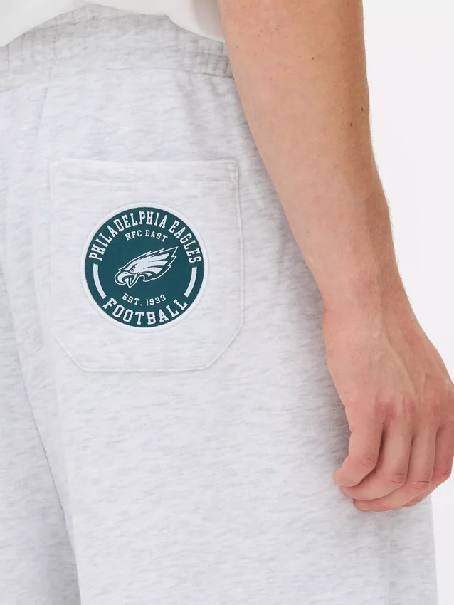 Pantaloni de trening cu logo-ul Philadelphia Eagles din NFL Pantaloni de trening cu logo-ul Philadelphia Eagles din NFL