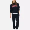 Pantaloni de trening cu manșete și imprimeu Pantaloni de trening cu manșete și imprimeu